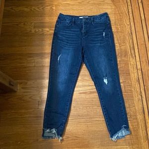 Women’s distressed raw hem high waisted jeans. Size ten, very stretchy